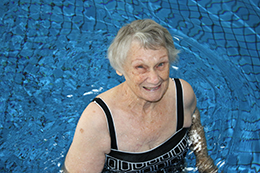Elderly lady in a pool