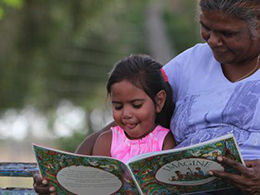 Mother reading to child