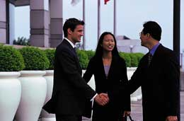 Business professionals shaking hands