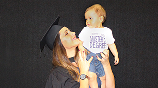 UniSA graduate Ania Craus, who recently completed her master’s degree, with her son, Manwel. 