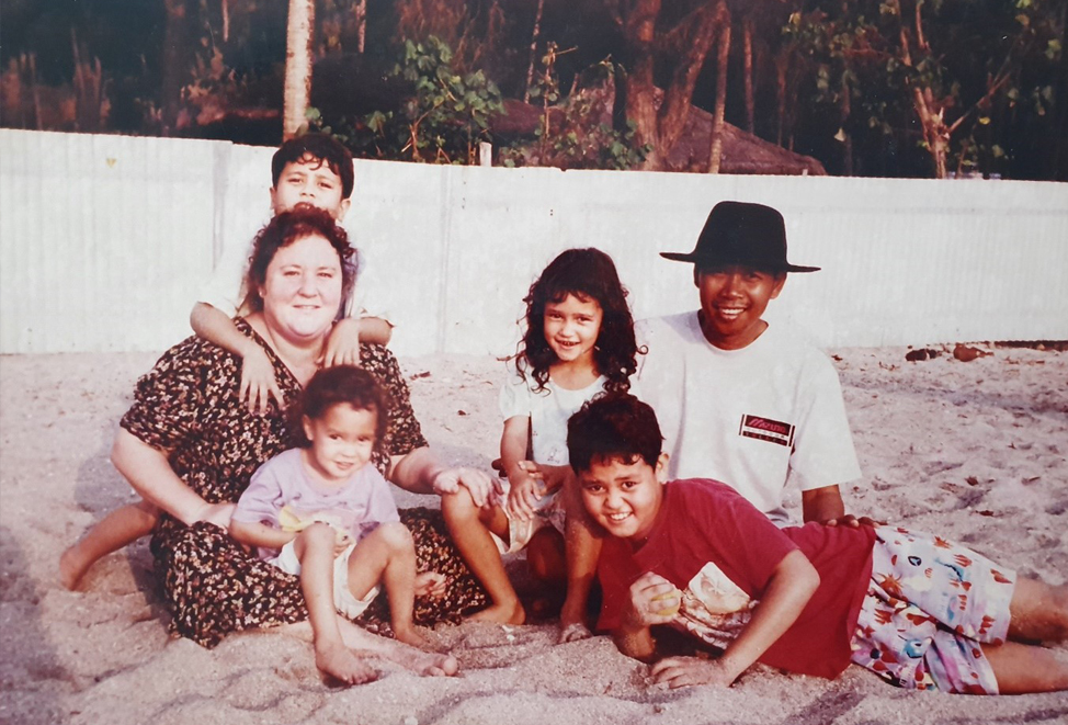 Sarah and her family on the beach near their home at Senggigi, Indonesia