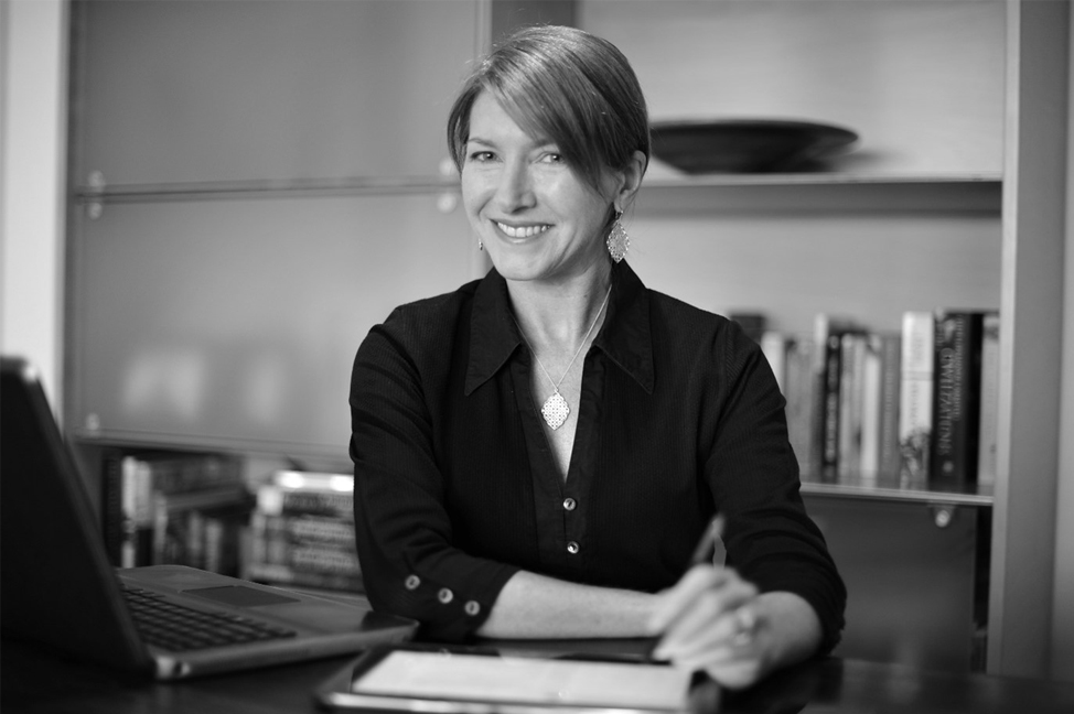 Dr Caroline Burns at her desk