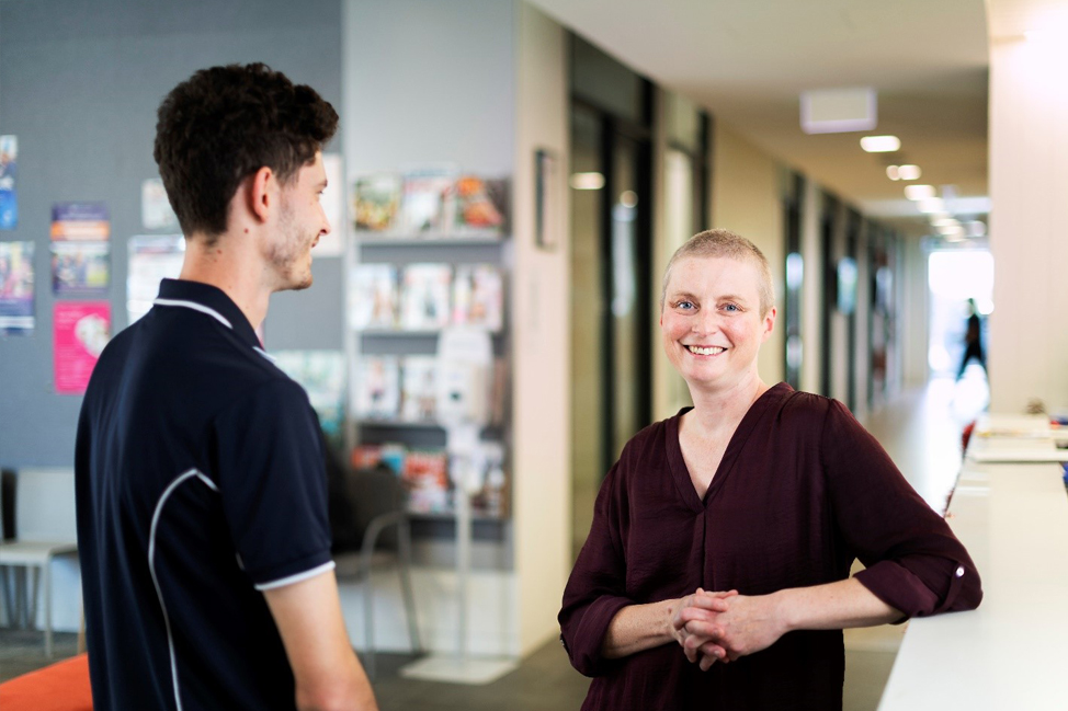 Dr Katia Ferrar with a physiotherapy student