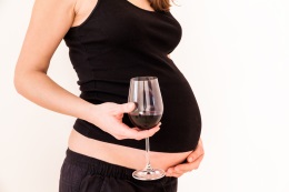 pregnant woman with wine