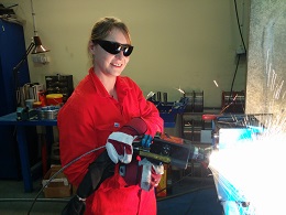 Woman holding arc sprayer