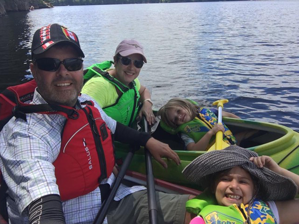 Jason with his wife and children enjoying themselves in the Canadian Summer.