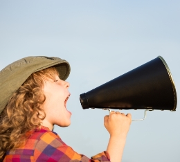 Child with loudspeaker