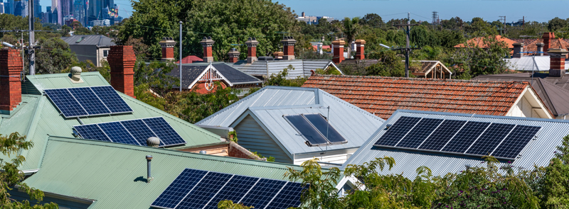 Solar panels on suburban house roofs in Melbourne, Australia