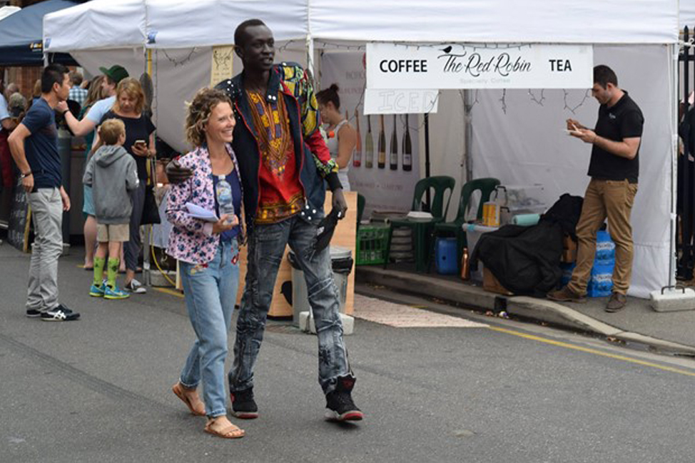 Founder & Director Victoria Lewis with music artist Gabriel Akon (DyspOra) at the 2018 Sanaa Street Festival.