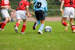 children playing soccer