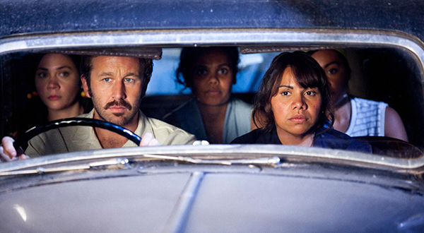 Image: Shari Sebbens as Kay, Chris O’Dowd as Dave Lovelace, Miranda Tapsell as Cynthia, Deborah Mailman as Gail and Jessica Mauboy as Julie by Lisa Tomasetti, The Sapphires, 2012, Courtesy Goalpost Pictures Australia Pty Ltd, National Film and Sound Archive of Australia