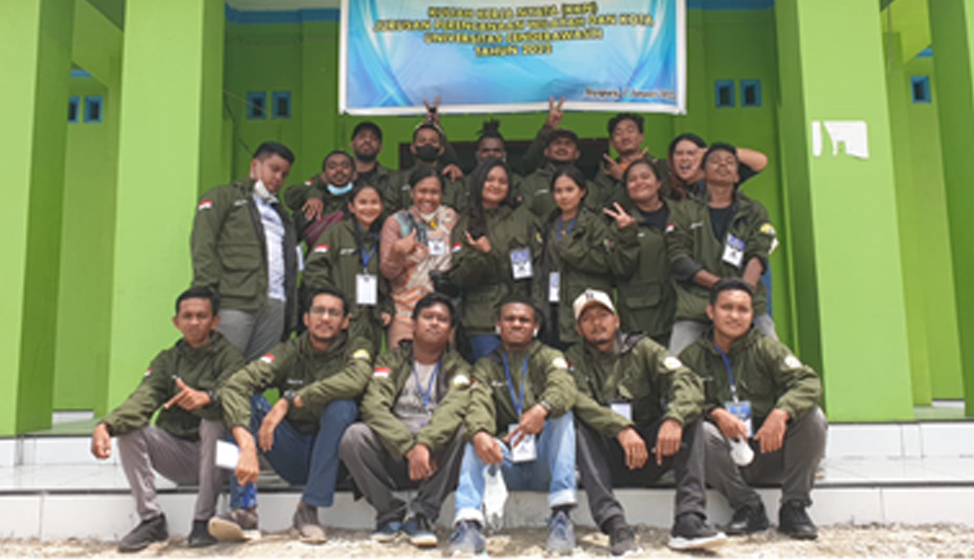 Monita (centre) with a group of students from Cenderawasih University participating in a community service program in remote areas of Jayapura, Papua in Indonesia