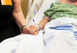 holding hands in hospital