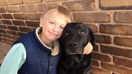 Angus Bond and labrador