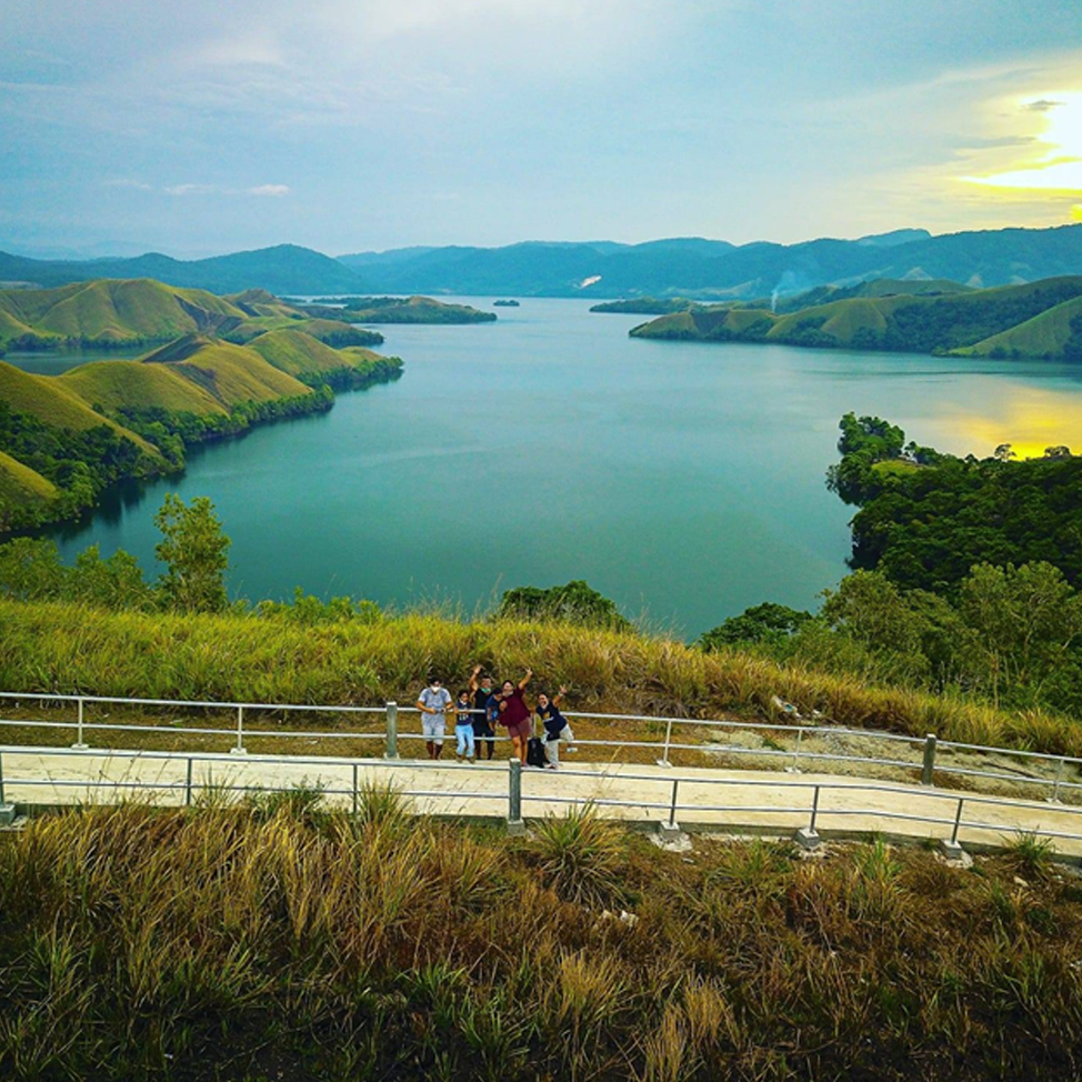 Monita and her family visiting the beautiful Sentani Lake of the Jayapura Regency in the Indonesian province of Papua.