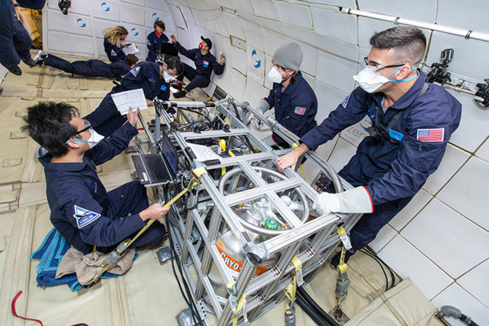 University students testing NASA technology in an expensive microgravity simulator at the Aerospace Corporation based in California.