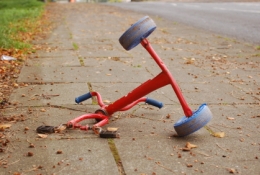 Broken bike on footpath 