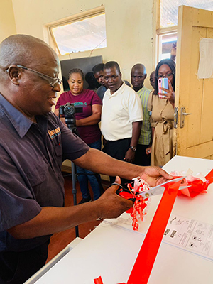 Zambian Mambwe District Commissioner William Banda officially receives one of the six 110 litre vaccine fridges