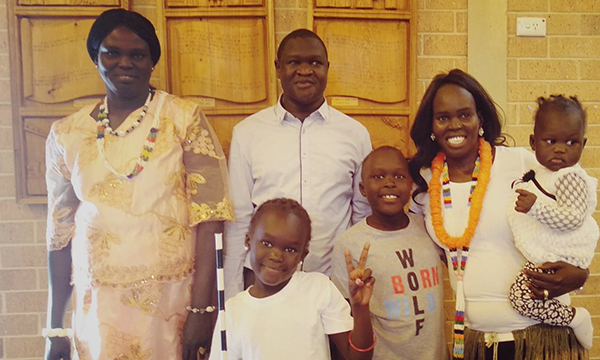 Abok Dau and Guor Michar with their family