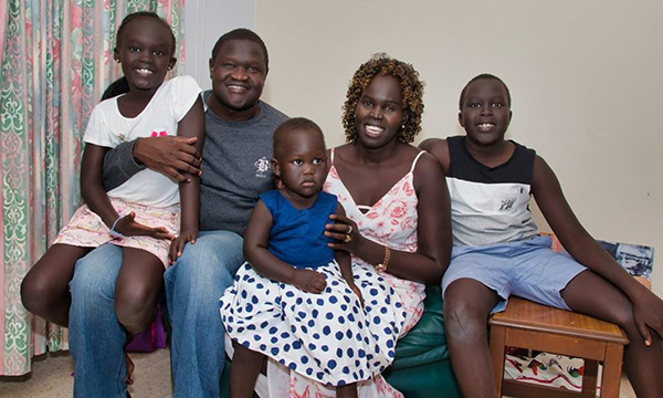 Guor Michar and Abok Dau, and family