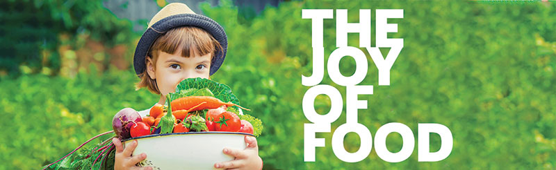 young girl with a bowl of vegetables