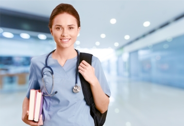 Young nurse with books and stethoscope
