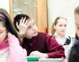 Student looks bored in class