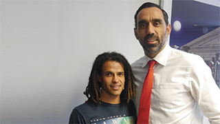 Scholarship recipient John Boxer with GO Foundation co-founder Adam Goodes.