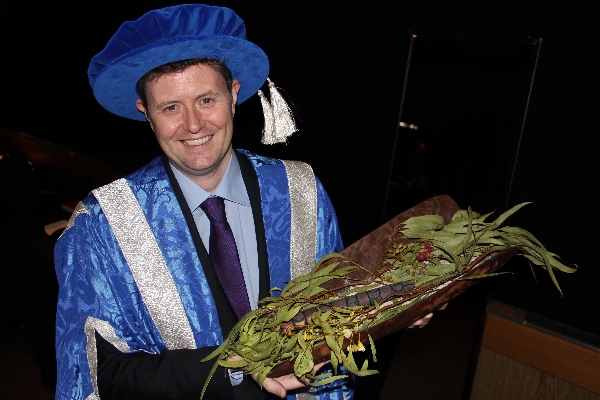 Professor David Lloyd receives a Kaurna welcome to country at the March 2013 graduations