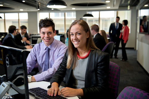 Students interacting with a computer