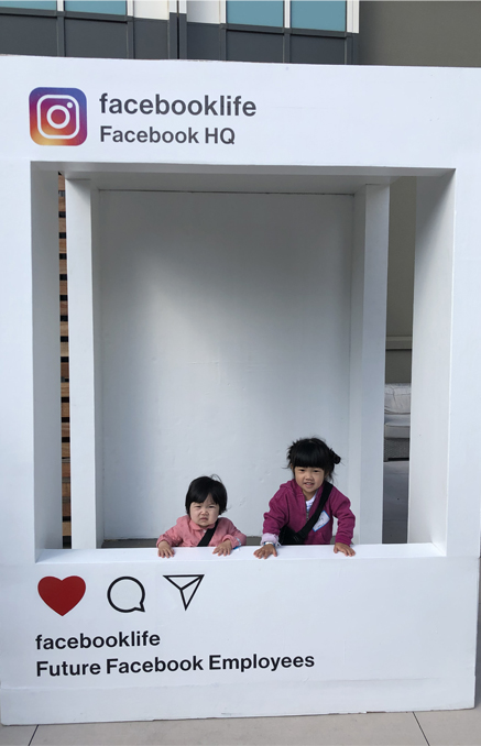 Kat's children playing in a facebook photo prop