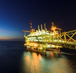 Offshore oil rig at night