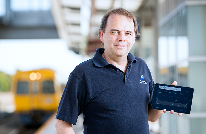 A man holding a tablet