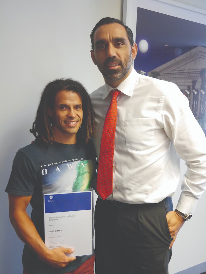 The inaugural recipient of the 2017 GO Scholarship, John Boxer, with CEO and former champion footballer,  
Adam Goodes. 