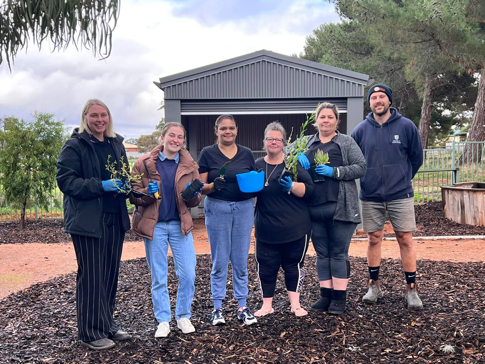Yarning Group women working on the Bush Foods Research Project and Healing Garden with Michael, Nadia and Alice from UniSA.