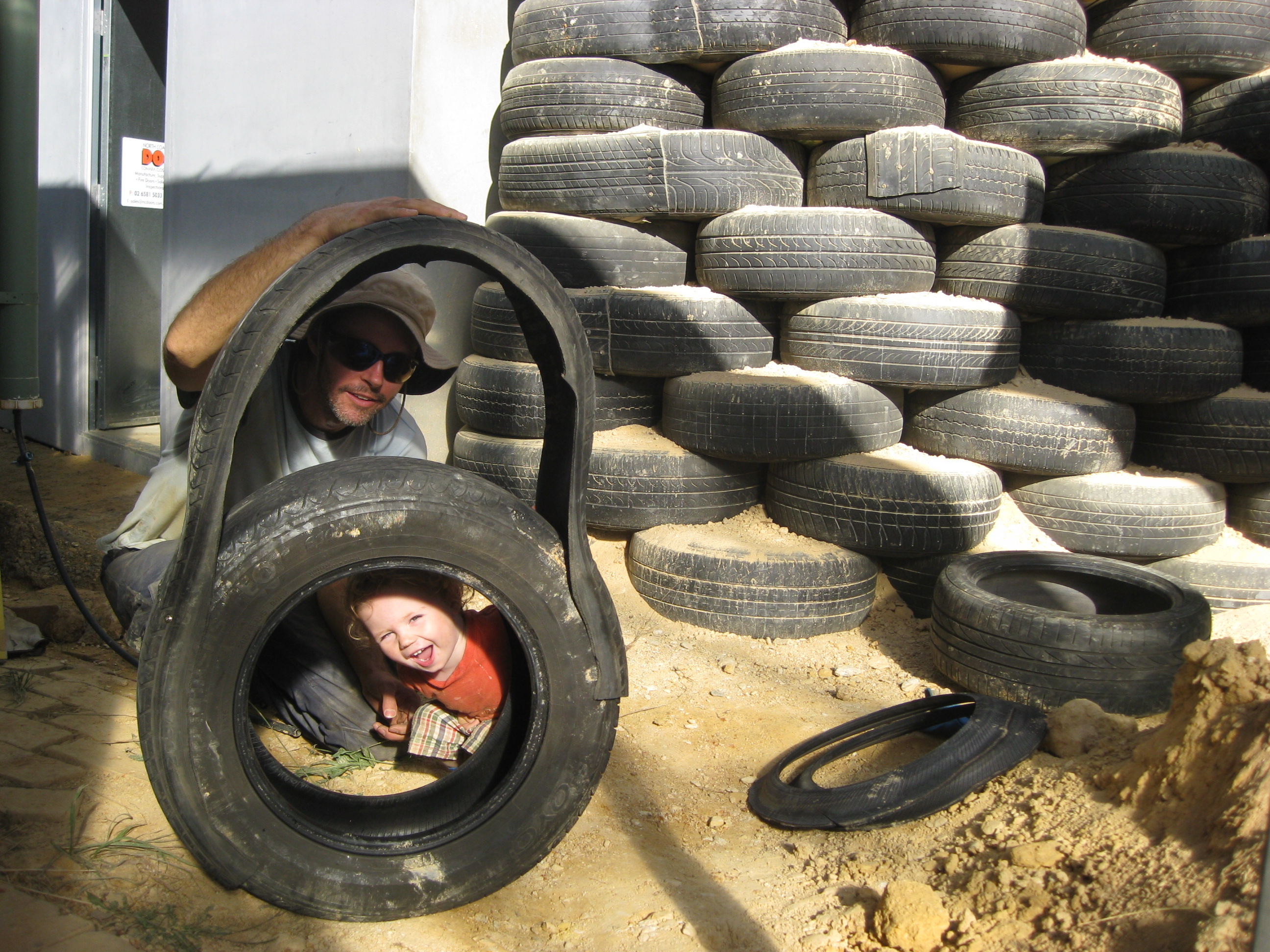 Dr Martin Freney and son Aquilo with the tyre wall