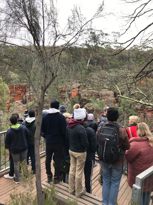 Students at Alligator Gorge in Mt Remarkable National Park, learning from Travis Thomas about Nukunu Country through stories.