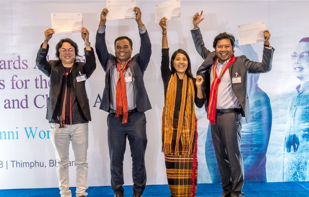 Pallab Chakma (far right) and the team celebrating a win at the Australia Awards Regional Alumni Workshop in 2018 where they would continue their lobbying until the Government took action