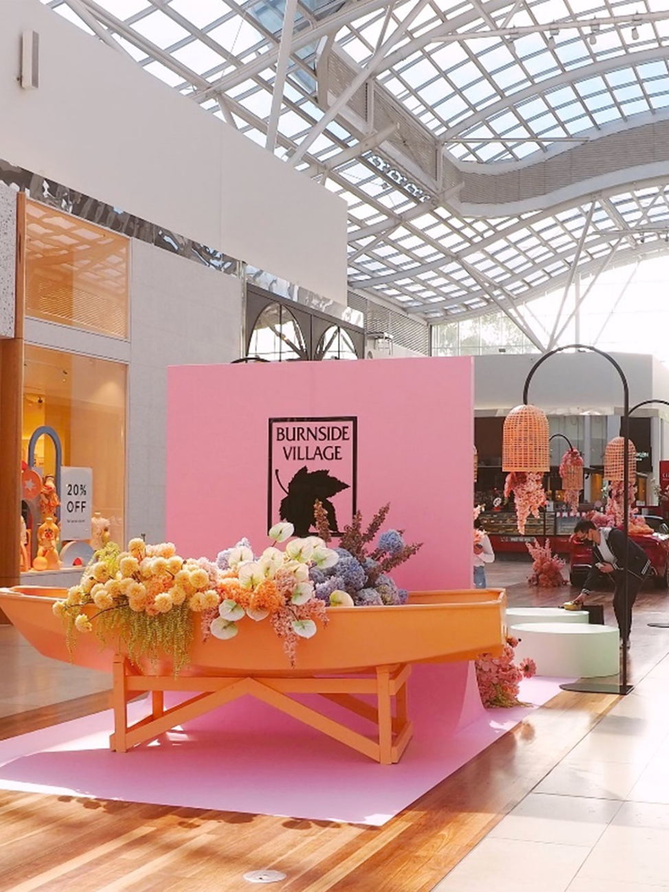 A floral installation Hygge Studio created for the Burnside Village Shopping Centre. Source.