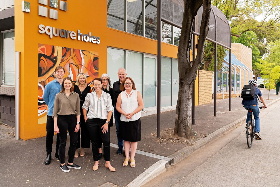Jason and his team outside of their Adelaide city office
