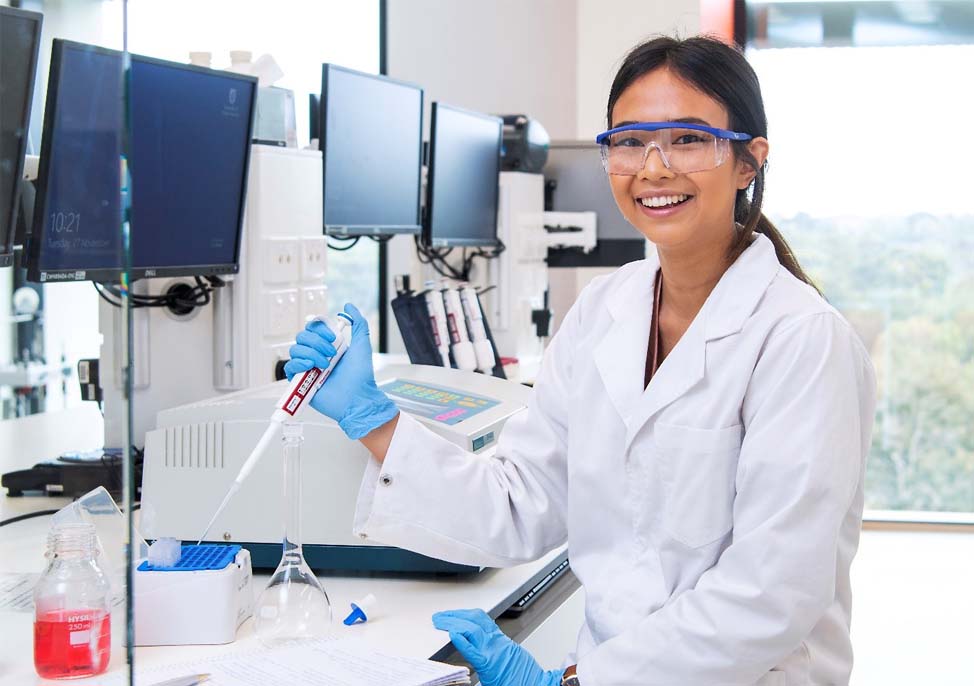 Cintya during her time as a pharmaceutical science student in the teaching laboratory in the UniSA Cancer Research Institute