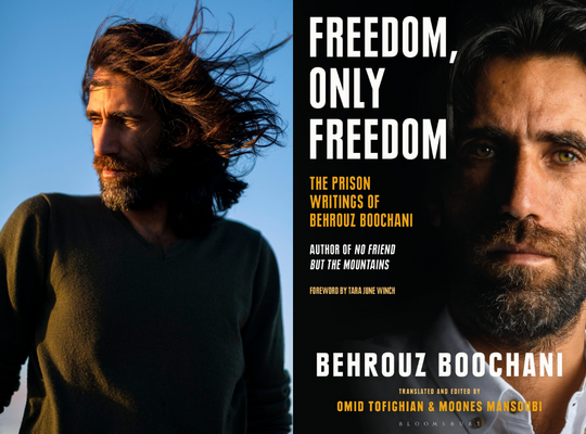 Behrouz Boochani with the cover of his book 'Freedom, Only Freedom'.