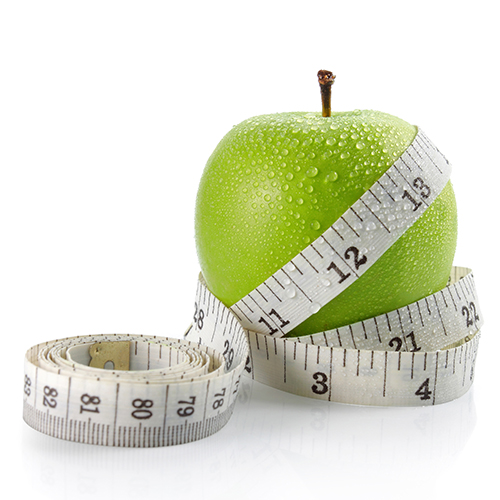 Apple with tape measure