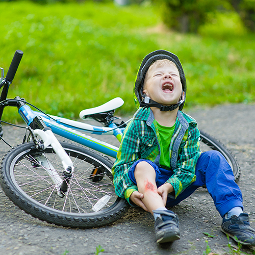 boy fallen off bike