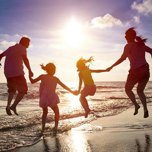 family at beach shutterstock_286469927_web.jpg