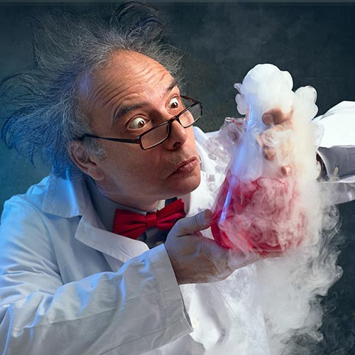 Mad scientist with beaker full of steaming liquid