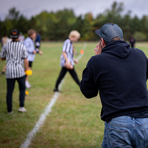 parent at sports game - shutterstock_2421199821_web.jpg