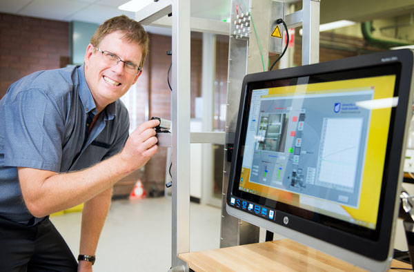 Professor John Fielk in lab