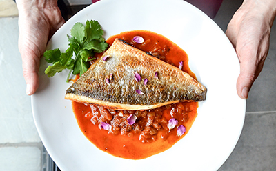 Cooked fish. Photo by Bryony Caldwell on Unsplash 