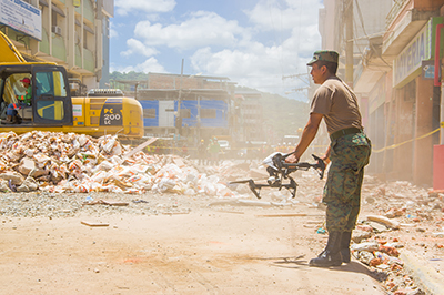 A drone is used by the Ecuadorian army to search for survivors after a 7.8 earthquake Portoviejo, Ecuador in April 2016. Researchers from UniSA and Middle Technical University have developed a more accurate camera system to detect signs of life. Photo: Fotos593 / Shutterstock.com